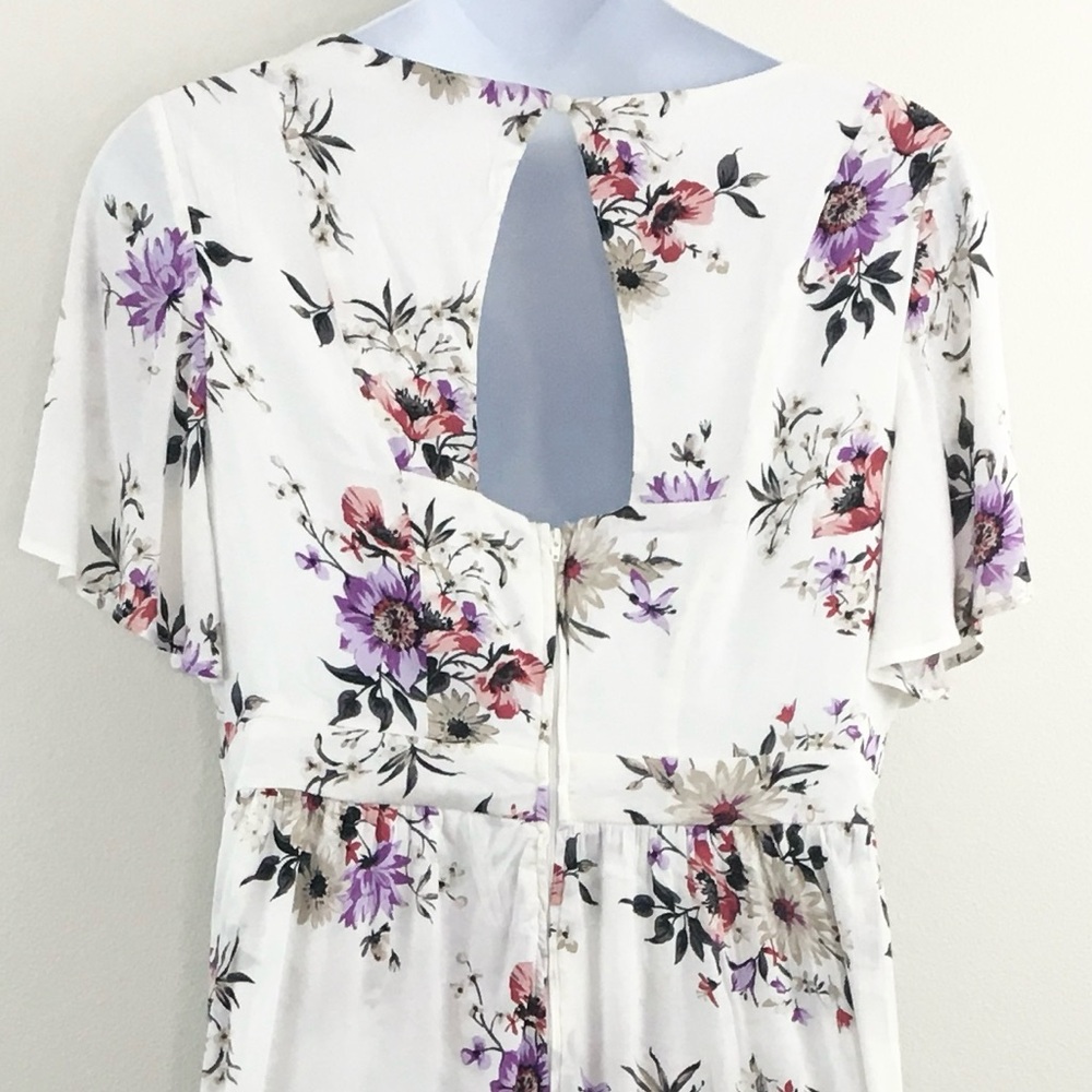 Torrid | Floral Shorts Romper with Open Front Skirt - Picture 7 of 9